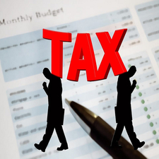 Tax text in red with human images